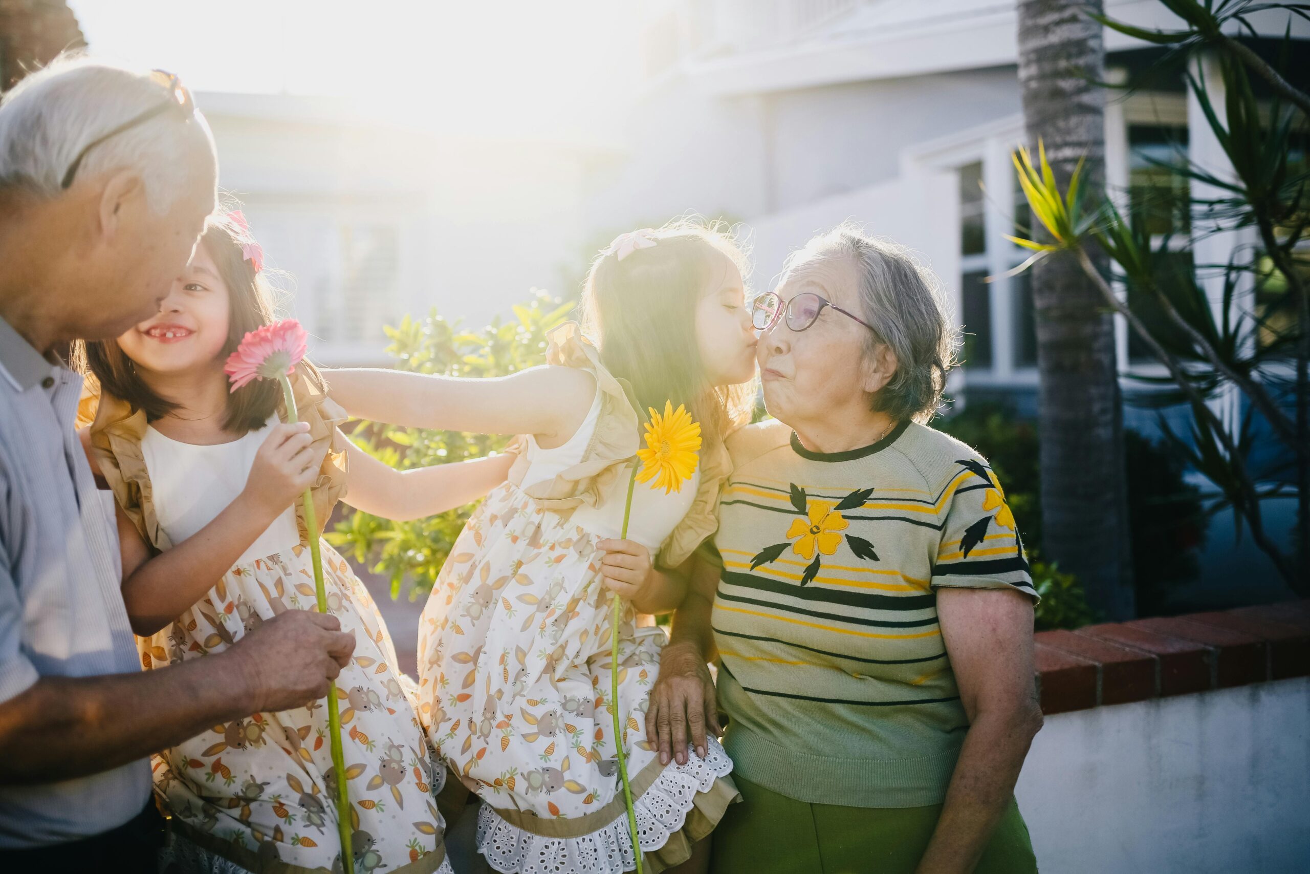 Older man and woman with grandchildren